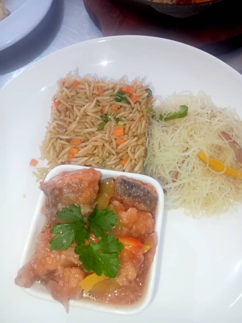 Stir Fry Basmati Rice, Singapore noodles and Fish in Batter Sauce