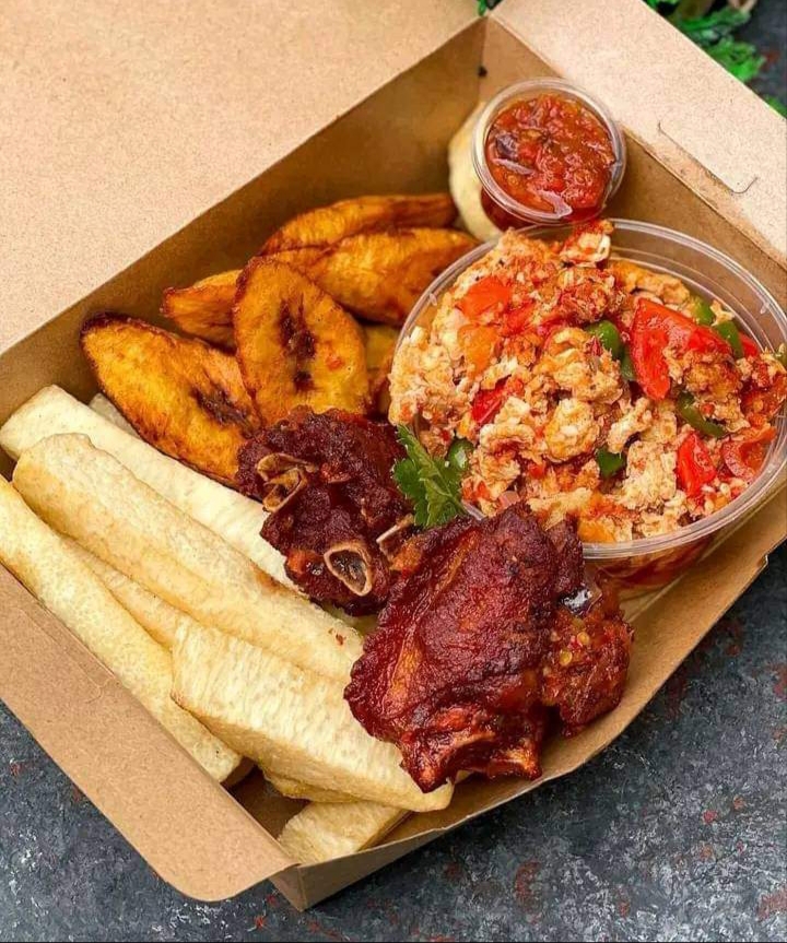 Fried yam,plantain, chicken and egg sauce