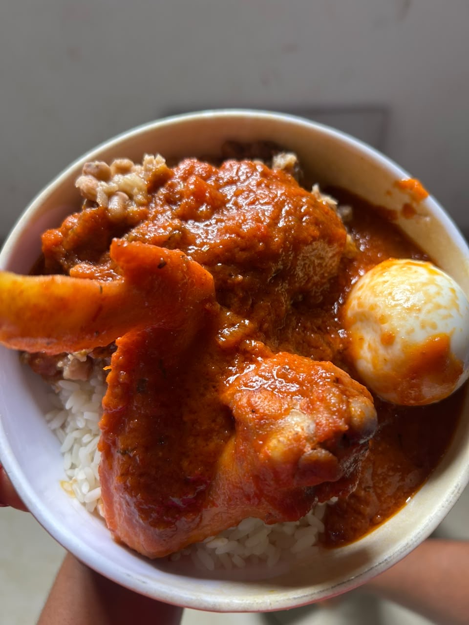 Rice and beans with chicken stew